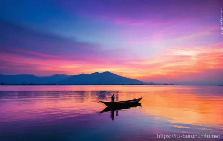 부룬디 여행 팁 - **"A breathtaking, serene sunset over Lake Tanganyika in Burundi. The sky is painted in vibrant hues...